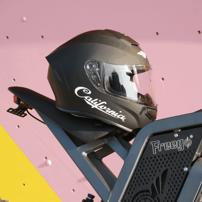 Freego California helmet resting on Freego electric bike seat