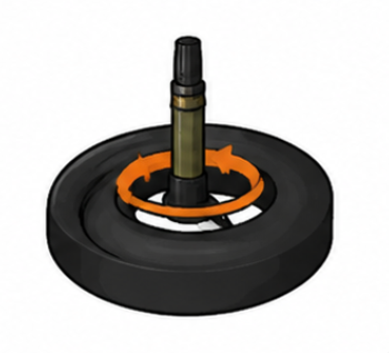 Close-up of a person replacing a bicycle inner tube to fix a flat tire