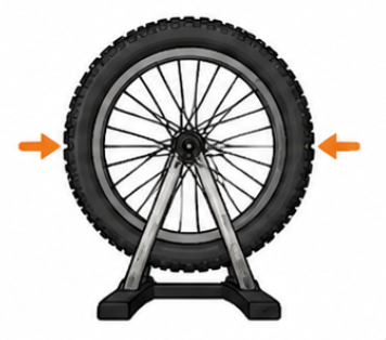 Close-up of a bicycle wheel being trued for improved stability and smoother ride
